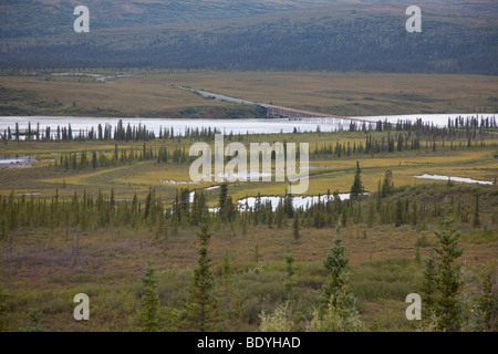 The Denali Highway bridge over the Susitna River in the remote wilderness east of Denali National Park. Stock Photo