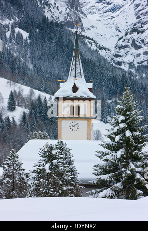Grindelwald, Village church after a heavy fall of snow, Jungfrau region, Bernese Oberland, Swiss Alps, Switzerland Stock Photo