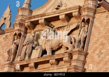 The Winged Lion ,seen here on Porta della Carta of the Doge's Palace,is the famous symbol of Venice,Venezia, in Italy,Italia Stock Photo