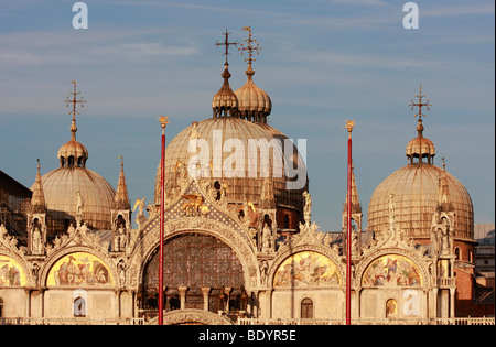 The Domes of the Basilica di San Marco, Venice,glow golden in the evening sun Stock Photo