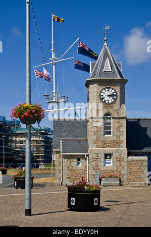 dh  ST PETER PORT GUERNSEY Weighbridge clock tower building and mast on roundabout julians pier Stock Photo