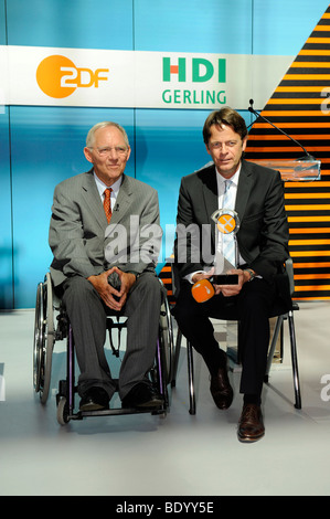 Federal Interior Minister Wolfgang Schaeuble and Rudi Cerne, a ZDF TV presenter at the award ceremony of the XY Prize to the wi Stock Photo