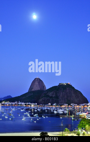 Sugarloaf Mountain, Pão de Açúcar, at night with full moon, Rio de Janeiro, Brazil, South America Stock Photo