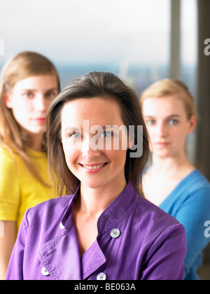 Business team looking at camera Stock Photo