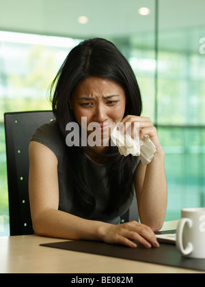 Portrait of a business woman crying Stock Photo