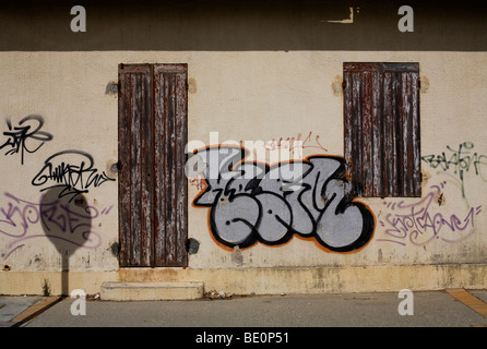 Graffiti on a closed beach shop at Carcans-Plage on the Atlantic coast near the Bordeaux town of Carcans in France Stock Photo