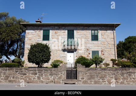 Typical Minho Region House made of granite stone in Vila Nova de Famalicão, Braga District Portugal. Stock Photo