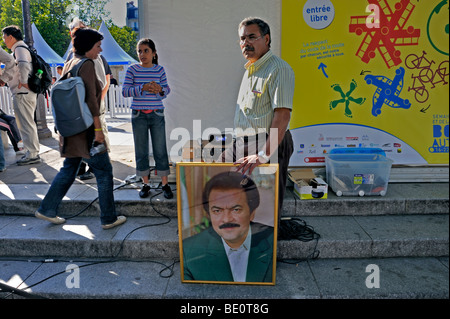 Paris, France, Demonstration of Iranian Citizens. to stop the Abuse of Human Rights at Ashraf Camp in Iraq. Man with Photo Stock Photo