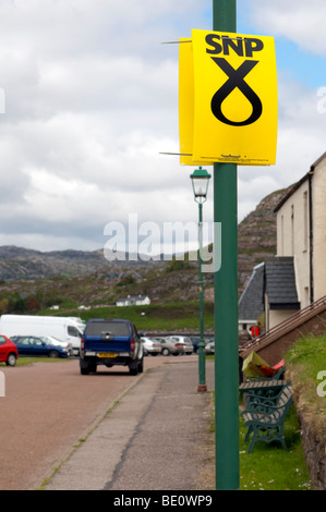 SNP logo attached to lamppost in Scottish village of Sheildaig, Torridon, Wester Ross, Scotland Stock Photo
