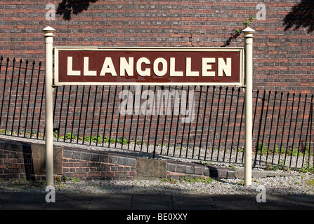 Station name sign on the platform of Llangollen railway station (the Llangollen Steam Railway) Stock Photo