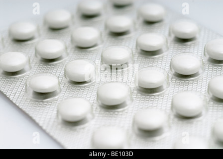 white coated tablets in blister packaging Stock Photo