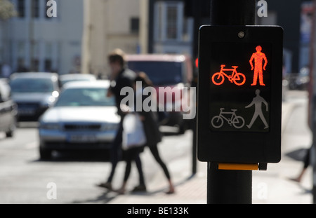 Pedestrians crossing the road using a Puffin Crossing in the Old Steine are of Brighton, UK. Picture Jim Holden. Stock Photo