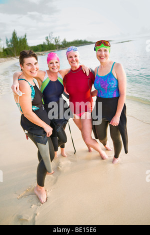 Women on tropical beach Stock Photo