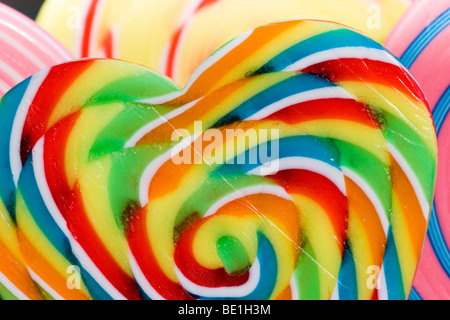 Four brightly coloured lollipops Stock Photo