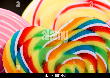 Three brightly coloured lollipops Stock Photo