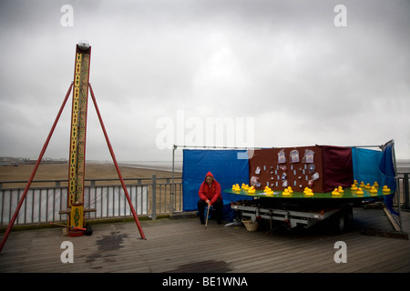 A 'hook a duck' stall on the seaside pier at Weston Super Mare, England, UK Stock Photo