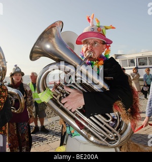 Musician in the De Propere Fanfare belgian marching band performing on the promenade, Aberystwyth Wales UK Stock Photo