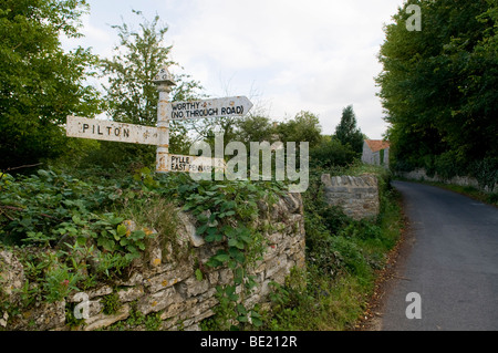 Country road sign in Pilton, Somerset, pointing to Worthy, where the Glastonbury Festival is sited each June. Stock Photo