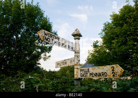 Country road sign in Pilton, Somerset, pointing to Worthy, where the Glastonbury Festival is sited each June. Stock Photo