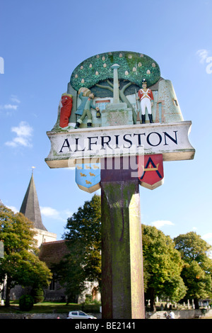 Village sign and parish church, Alfriston, East Sussex, England, UK Stock Photo