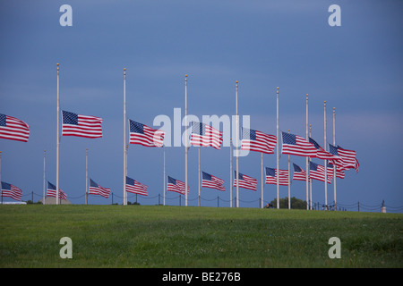 Flags flying at half-mast  at the Washington Monument after the funeral of Senator Edward Kennedy Stock Photo