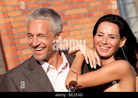 Attractive happy couple outside Stock Photo