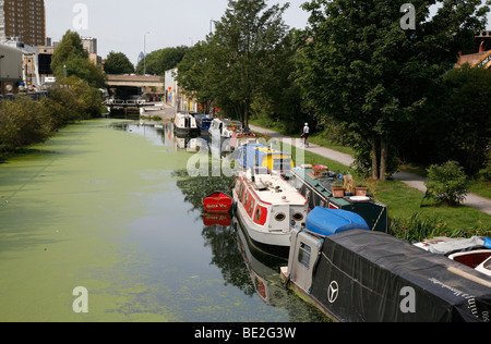 Boats moored on the Hertford Union Canal, Hackney Wick, London, UK Stock Photo