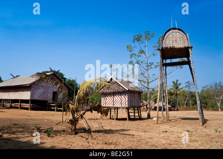 'Woman house' and taller 'Man house', Kreung hilltribe village, near Banlung, Ratanakiri Province, Cambodia Stock Photo