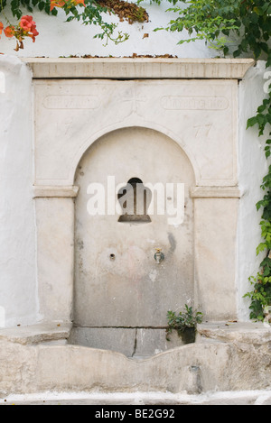 Public water fountain in Paros, Greece Stock Photo