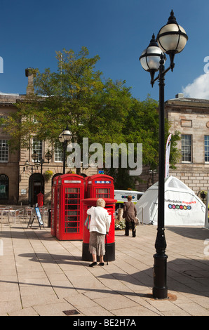 UK, England, Staffordshire, Stafford, Market Square, K6 phone boxes Stock Photo