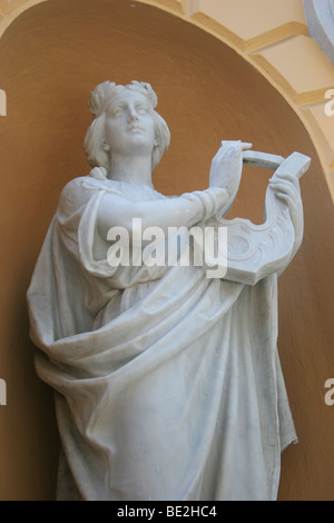 Representation of Music by a statue at the National Theater of Panama City. Stock Photo