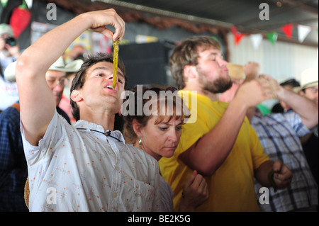 USA Hatch New Mexico- Chile Festival- chile eating contest- eating hot big Jim peppers Stock Photo