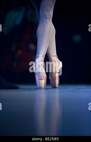 A ballet dancer's feet on stage Stock Photo