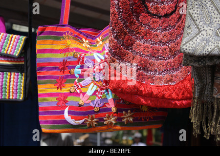 Some hand made bags on display at a street market in Panama City. Stock Photo