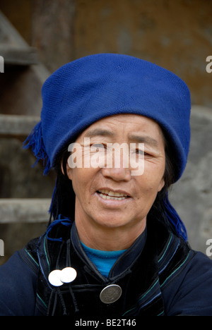Portrait, ethnology, woman of the Hani ethnic group, dark blue clothes, near Xinji, Yuanyang, Yunnan Province, People's Republi