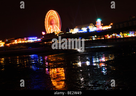 Illuminated Ferris wheel on Central pier Blackpool Stock Photo