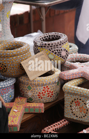 Colorful hand made ceramic pottery on display at a market in Panama City. Stock Photo