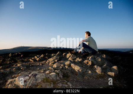 Man, mid 40s, looking from Herzogenhorn Mountain towards Feldberg Mountain in the Black Forest, Baden-Wuerttemberg, Germany, Eu Stock Photo