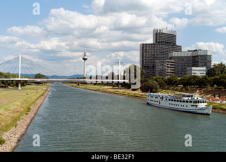 Collini-Center at the River Neckar with tourist boats, Friedrich-Ebert-Bruecke bridge at back, Mannheim, Baden-Wuerttemberg, Ge Stock Photo