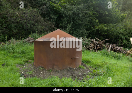 A Charcoal burning kiln in alder woodland near Aber Falls,  in Snowdonia National Park, Wales Stock Photo