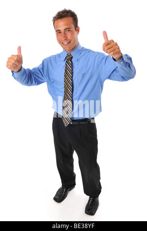 Young businessman with thumbs up gesture against a white background Stock Photo