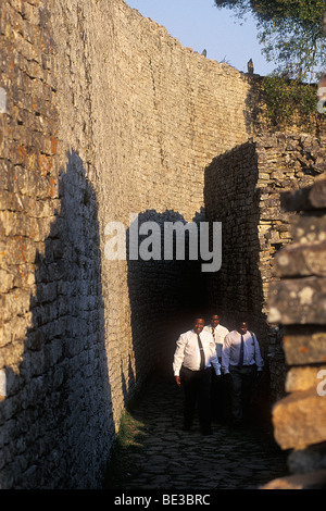 A group of teachers tour the Great Zimbabwe ruins, near Masvingo, Zimbabwe. Stock Photo