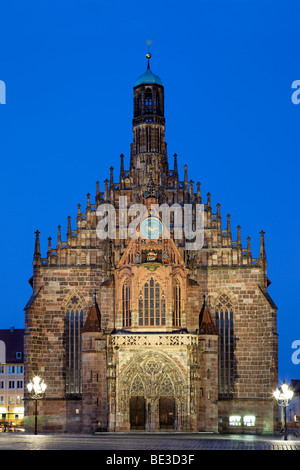 Frauenkirche Church of Our Lady, portal, Gothic, catholic, church, evening, night, illuminated, old town, Nuremberg, Middle Fra Stock Photo