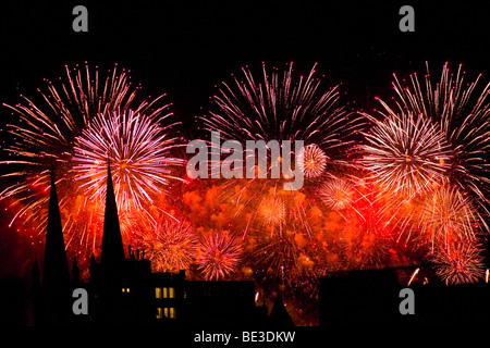 Fireworks of the Pyromusikale festival at the former airport Berlin-Tempelhof, front left the silhouettes of the twin towers of Stock Photo