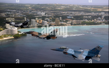 Three F-16 Fighting Falcons fly in formation over Tumon Bay, Guam. Stock Photo