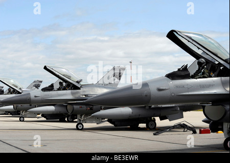F-16 Fighting Falcons await to launch for a training mission. Stock Photo
