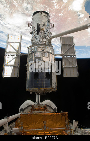 The Hubble Space Telescope is released from the cargo bay of Space Shuttle Atlantis. Stock Photo