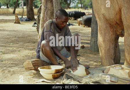 Wood carver at work, Namibia, Africa Stock Photo