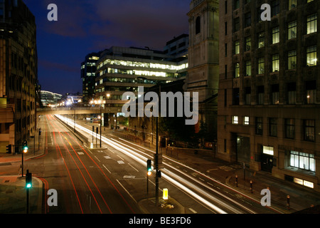 Traffic in the city centre at the blue hour, Monument, City of London, England, United Kingdom, Europe Stock Photo