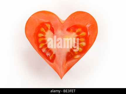 Cut tomato, heart-shape Stock Photo